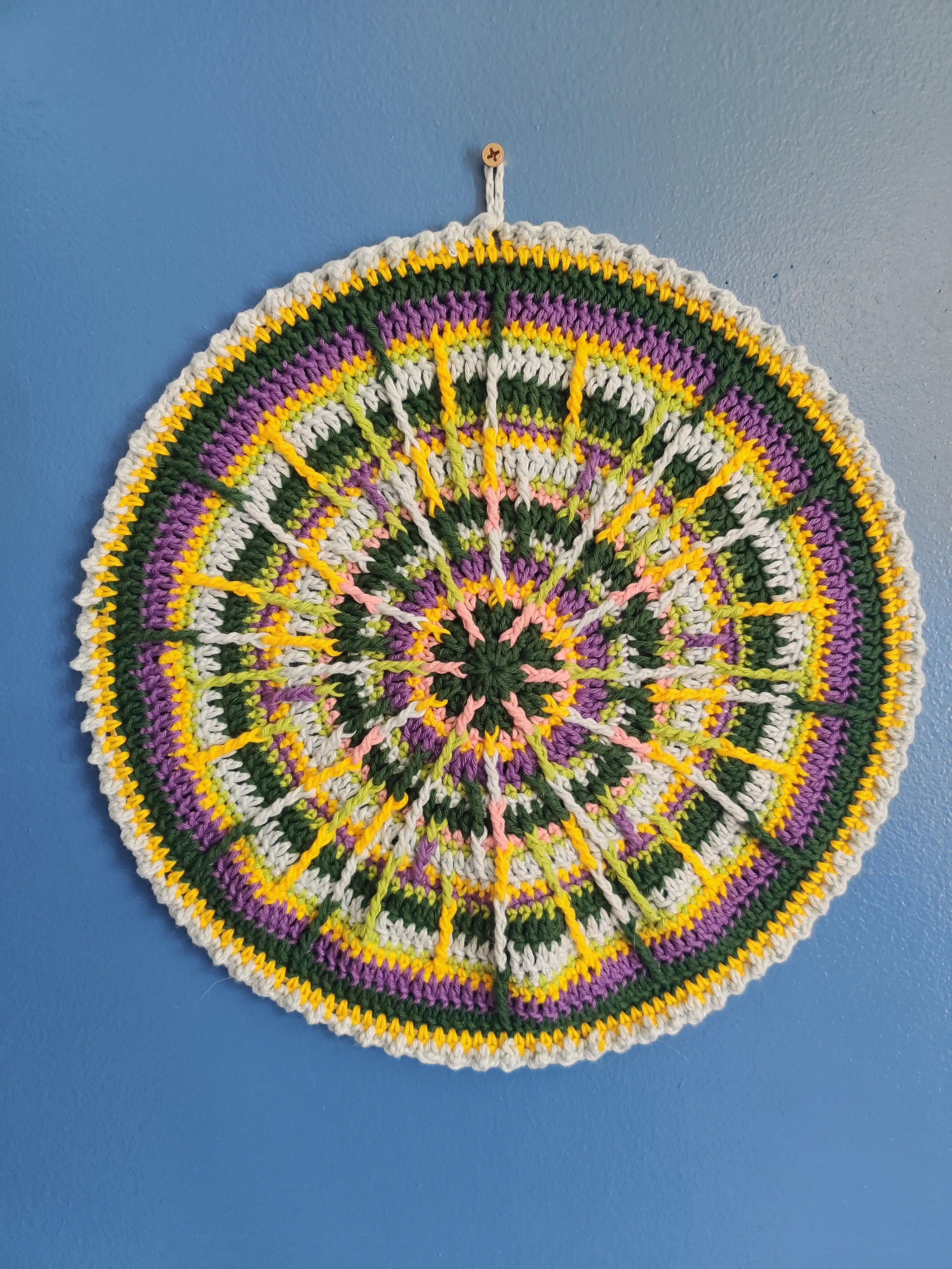 Close-up of colorful crochet artwork and amigurumi pieces